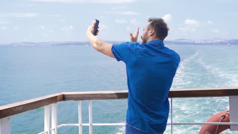 Teenager-traveling-on-cruise-ship-talking-on-phone.-Slow-Motion.